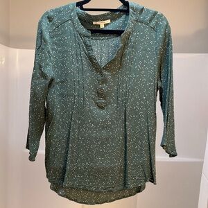 Teal blouse.